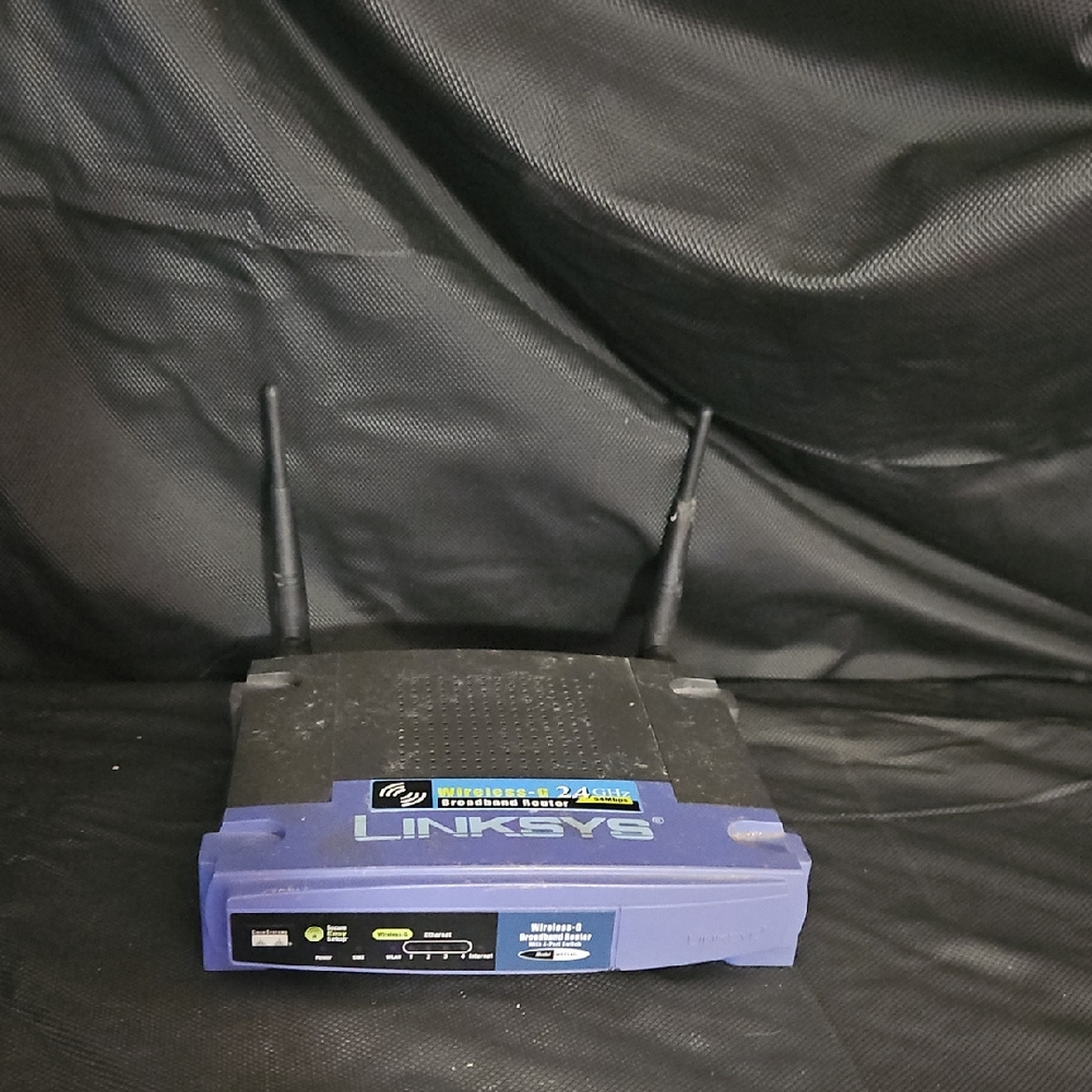 Linksys Blue and Black Router with Antennas